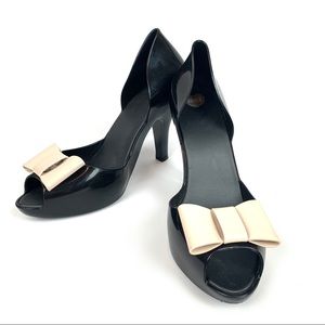 Melissa nude and black bow peep toe heels